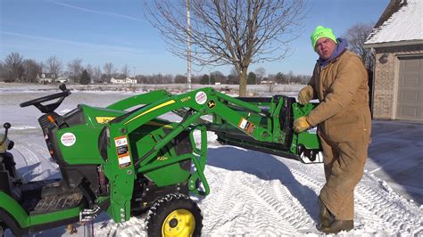 john deere 240 skid steer quick attach mechenism|john deere quick attach vs ssqa.